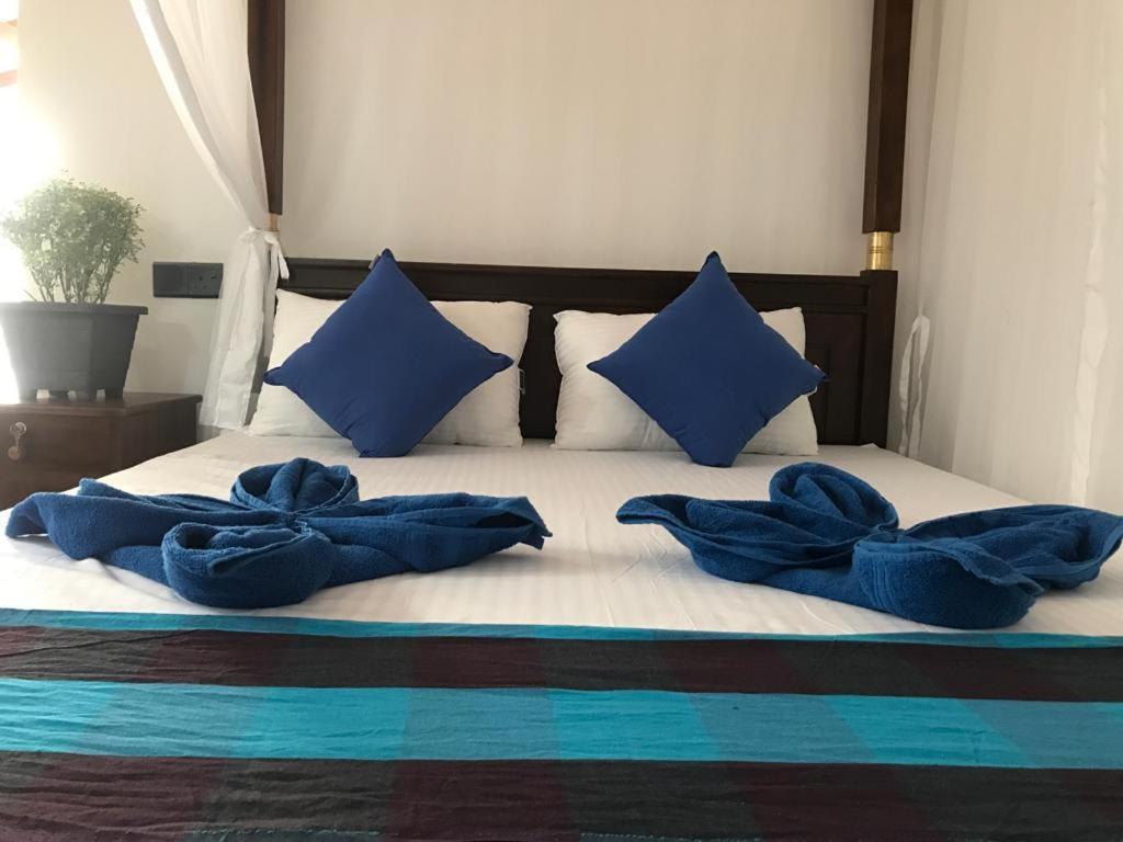 Bisandu Guesthouse Мірісса Номер фото