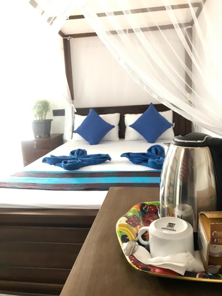 Bisandu Guesthouse Мірісса Номер фото