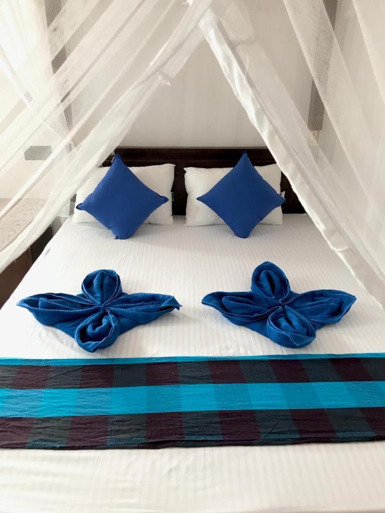 Bisandu Guesthouse Мірісса Номер фото